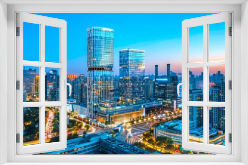 Stunning cityscape of a modern urban skyline at sunset with dazzling lights. The image showcases skyscrapers and a bustling city life. Ideal for travel, urban design, and architectural content. AI
