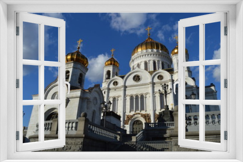 Church with gold cross in sunshine (Moscow downtown)