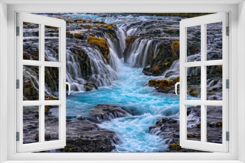 Fototapeta Naklejka Na Ścianę Okno 3D - Brúarfoss (Bridge Fall), is a waterfall on the river Brúará in southern Iceland where a series of small runlets of water runs into a beautiful, turquoise-blue colored pool.