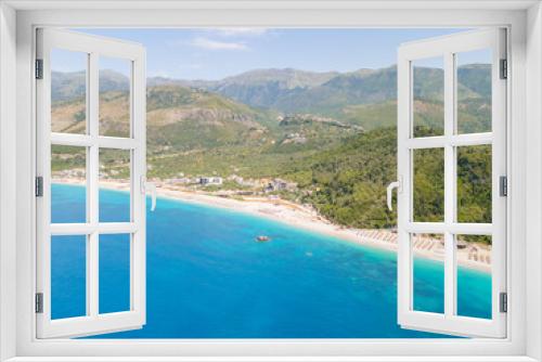 Fototapeta Naklejka Na Ścianę Okno 3D - Aerial view of beach clubs along the Himare coastline part of the Albanian Riviera on the Ionian Sea in southern Albania 