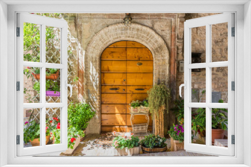 Fototapeta Naklejka Na Ścianę Okno 3D - Elegante porta di legno con vasi di fiori