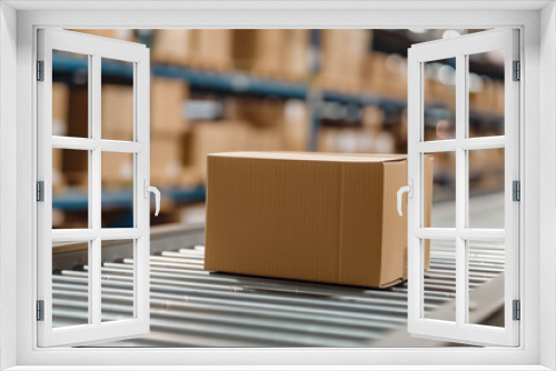 Conveyor belt in a distribution warehouse with row of cardboard box packaging for e-commerce. Delivery and automated logistics concepts.
