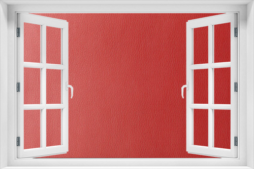 Texture of genuine leather, artificial leatherette red background