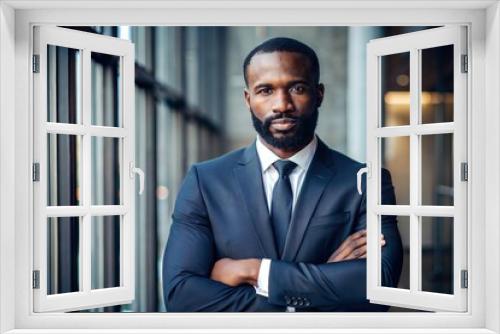 Black Man in Business Suit with Arms Crossed
