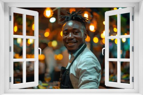 Smiling Chef in a Bustling Evening Restaurant 