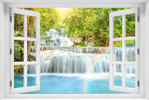 Fototapeta Naklejka Na Ścianę Okno 3D - Beautiful waterfall with rainbow in deep forest, Thailand.