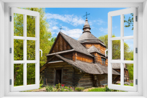 Fototapeta Naklejka Na Ścianę Okno 3D - Old wooden church in the woods.