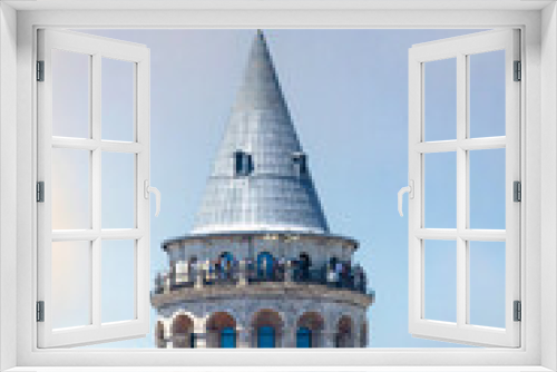 Galata Tower on dramatic sky background. Historical artifacts.	