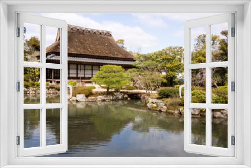 Fototapeta Naklejka Na Ścianę Okno 3D - Tea house and pond in Isuien garden, Nara