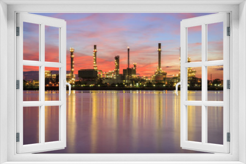 Fototapeta Naklejka Na Ścianę Okno 3D - Oil refinery factory in silhouette and sunrise sky