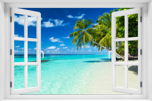 Fototapeta Naklejka Na Ścianę Okno 3D - coco palms on tropical paradise beach with turquoise blue water and blue sky