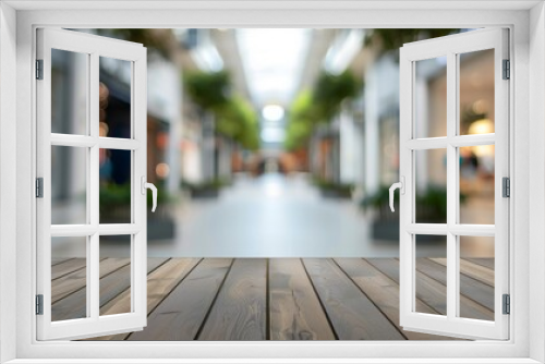 Empty wooden table top for product display, presentation stage. Blurred shopping center or mall in the background.