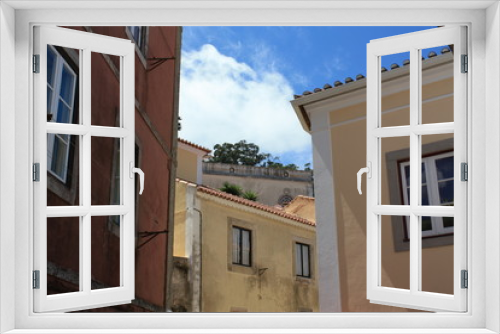 Fototapeta Naklejka Na Ścianę Okno 3D - Portugiesische Häuserflucht 