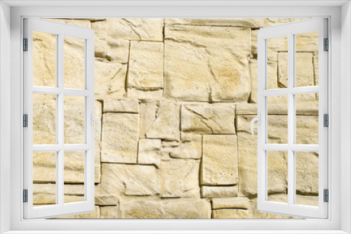Fototapeta Naklejka Na Ścianę Okno 3D - Decorative relief cladding slabs imitating stones on wall