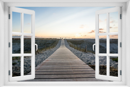 Fototapeta Naklejka Na Ścianę Okno 3D - wooden walkway to beach at sunset
