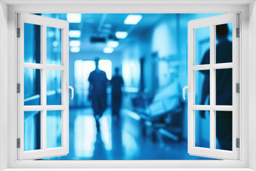 blurred hospital corridor with medical staff silhouettes cool blue tones modern medical equipment sense of urgency and professionalism
