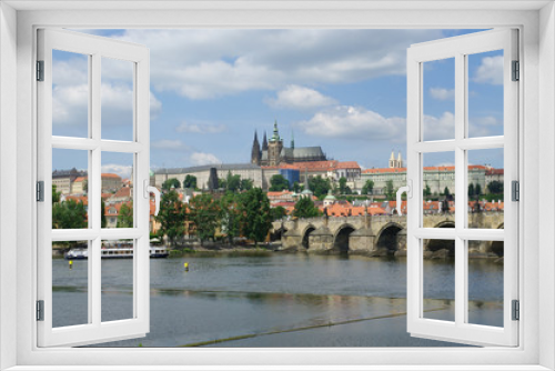 View of Charles Bridge and Prague Castle from the river Vltava, Czech Republic
