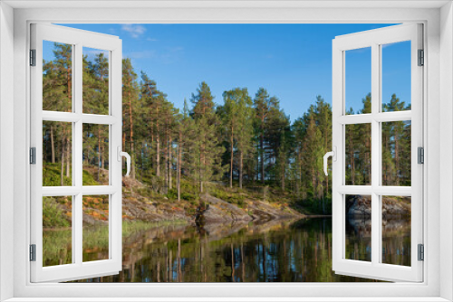 Fototapeta Naklejka Na Ścianę Okno 3D - Coyonsaari Island bay on a warm June evening. Lake Ladoga. Karelia, Russia