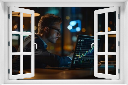 Businessman analyzing financial graphs on a laptop at night in an office. Conceptual image of financial analysis, business strategy, and investment planning. High-quality stock photo. Generative AI.