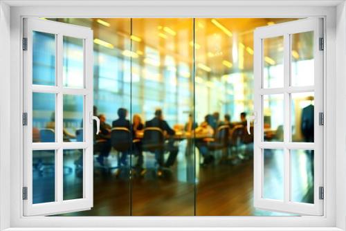 Dynamic Modern Office with Blurred Business Professionals in Glass-Walled Conference Room