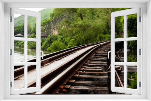 Fototapeta Naklejka Na Ścianę Okno 3D - Railway tracks through forest