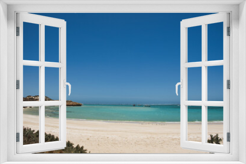 Fototapeta Naklejka Na Ścianę Okno 3D - Shallow sea with pleasure craft and a sandy coast at Coral Bay, Ningaloo Coast, Western Australia
