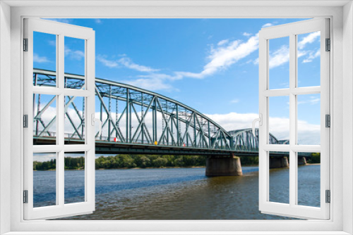 Fototapeta Naklejka Na Ścianę Okno 3D - Steel bridge in Torun over the Vistula river, Poland