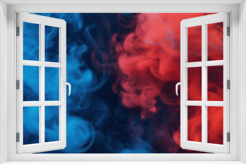 Vibrant red and blue smoke swirling and blending in an abstract, mysterious background, creating a dreamy and ethereal visual effect.