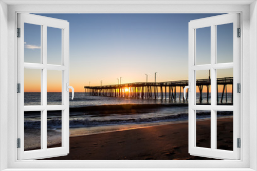 Fototapeta Naklejka Na Ścianę Okno 3D - Virginia Beach fishing pier at sunrise as seen in silhouette.