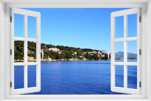 Fototapeta Naklejka Na Ścianę Okno 3D - Sea view. Mountain view. Town view. Beautiful Ionian dark blue sea. Sky and sea. Beauty in nature. Corfu. Kerkyra. Greece island