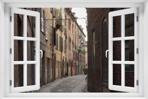 Fototapeta Naklejka Na Ścianę Okno 3D - Ancient medieval street in the downtown of Ferrara city
