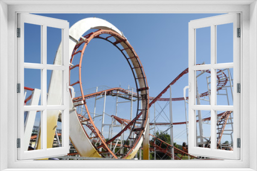 Fototapeta Naklejka Na Ścianę Okno 3D - Rollercoaster track in a funpark