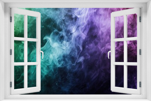 Smoke in shades of purple green and blue blend against dark setting