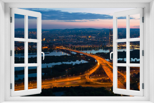 Vienna at night with Danube River and Island (Donauinsel)