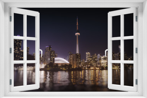Fototapeta Naklejka Na Ścianę Okno 3D - Toronto Skyline at Night. The Toronto, Canada city skyline at night.