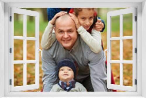 happy family in autumn park