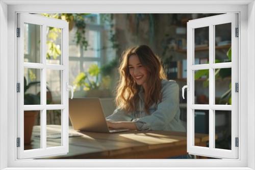 Smiling Young Woman Working in Bright Office