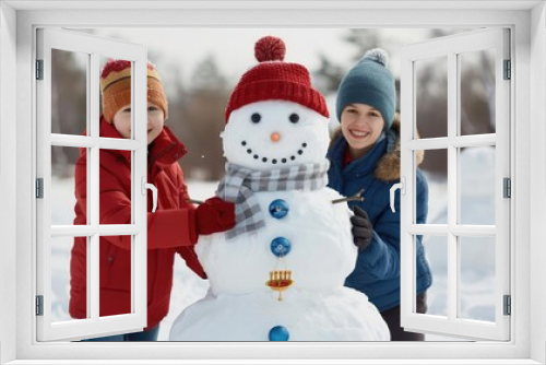 Family building a snowman with Hanukkah decorations, winter celebration, joyful holiday scene