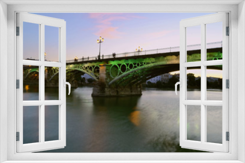 Fototapeta Naklejka Na Ścianę Okno 3D - Atardecer en el Puente de Triana