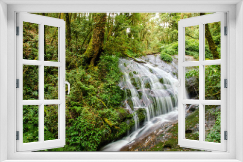 Fototapeta Naklejka Na Ścianę Okno 3D - small waterfall in deep forest
