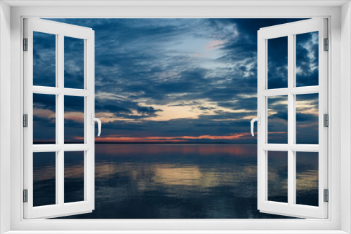 Fototapeta Naklejka Na Ścianę Okno 3D - Beautiful sunset over calm lake 