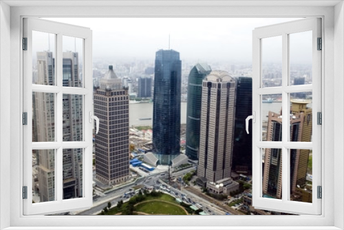 Fototapeta Naklejka Na Ścianę Okno 3D - Aerial view of Shanghai city with skyscrapers and Huangpu river
