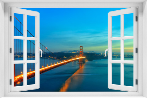 Fototapeta Naklejka Na Ścianę Okno 3D - Golden Gate Bridge after sunset illuminated by lights. Sunset over San Francisco bay California USA