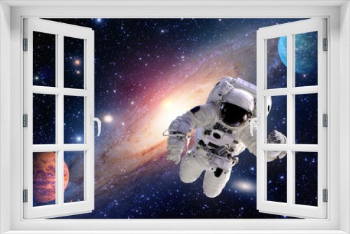 Fototapeta Naklejka Na Ścianę Okno 3D - Astronaut spaceman outer space solar system people planet universe. Elements of this image furnished by NASA.