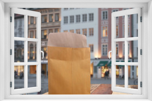 Fototapeta Naklejka Na Ścianę Okno 3D - paper shopping bag with city  background