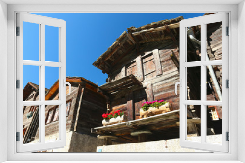 Fototapeta Naklejka Na Ścianę Okno 3D - Zermatt, old buildings constructed in the traditional style of the barns, Valais