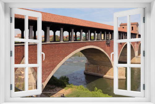 Fototapeta Naklejka Na Ścianę Okno 3D - covered bridge over the TICINO River in Pavia City in Italy