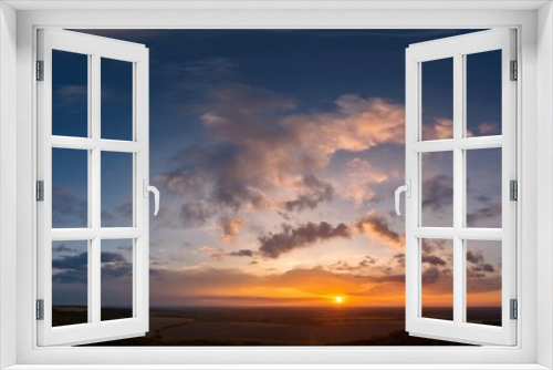 panorama of the evening sky with setting sun