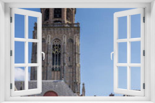 Fototapeta Naklejka Na Ścianę Okno 3D - Lebuinus church and old houses in Deventer