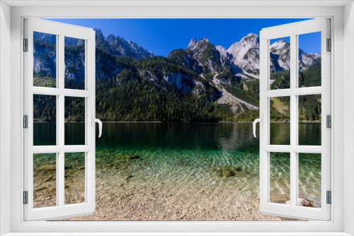 Fototapeta Naklejka Na Ścianę Okno 3D - Beautiful landscape of alpine lake with crystal clear green water and mountains in background, Gosausee, Austria